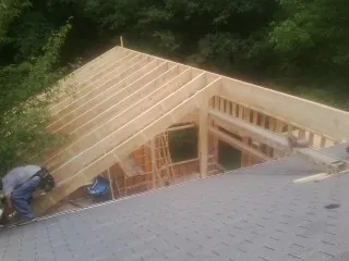 Framing a new roof addition that ties into an existing shingle roof in Alvord