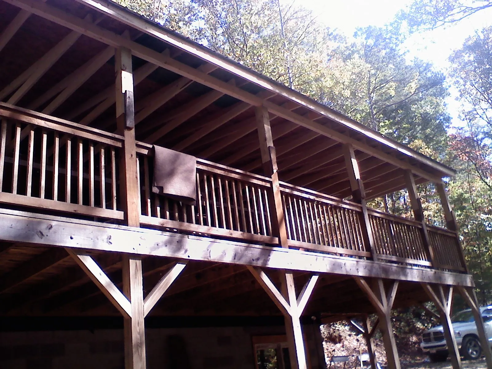 Timber framing under a new elevated porch and deck — Roof Leak Repair in Alvord by Roofing Brothers